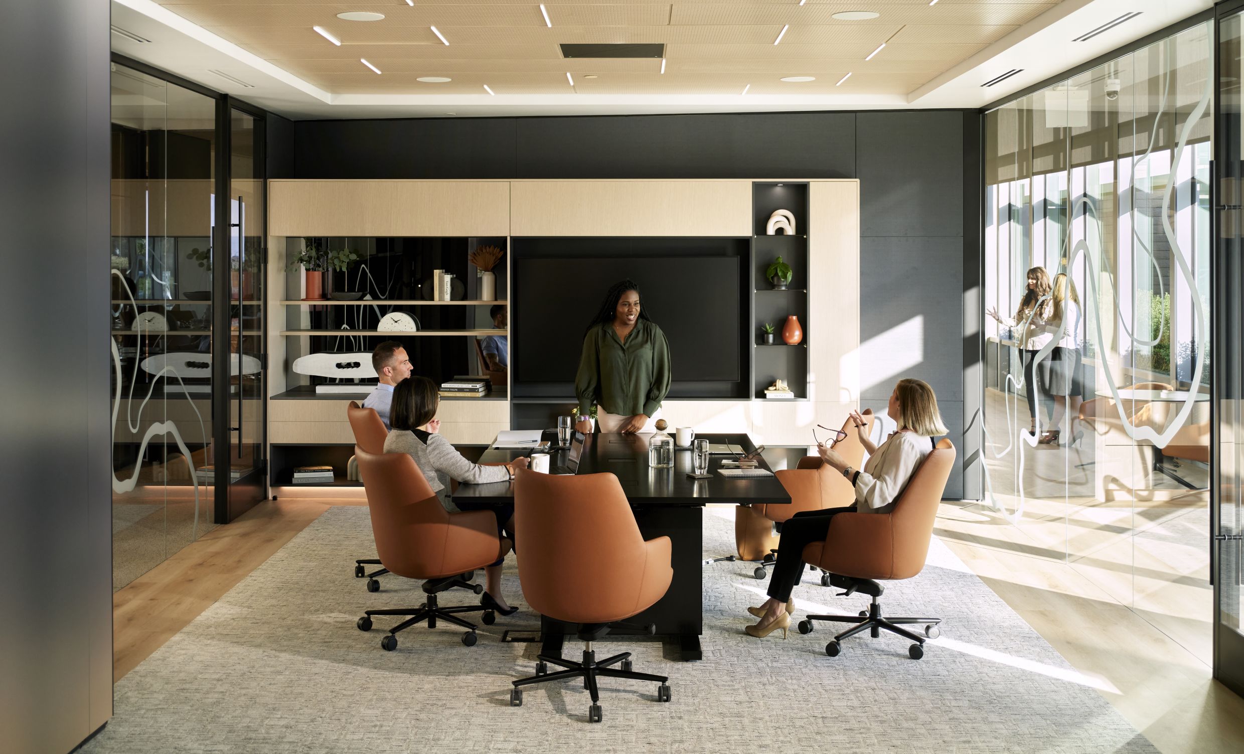 Businesspeople walking at modern office. Group of business employees at coworking center. Motion blur. Concept work process. Wide image